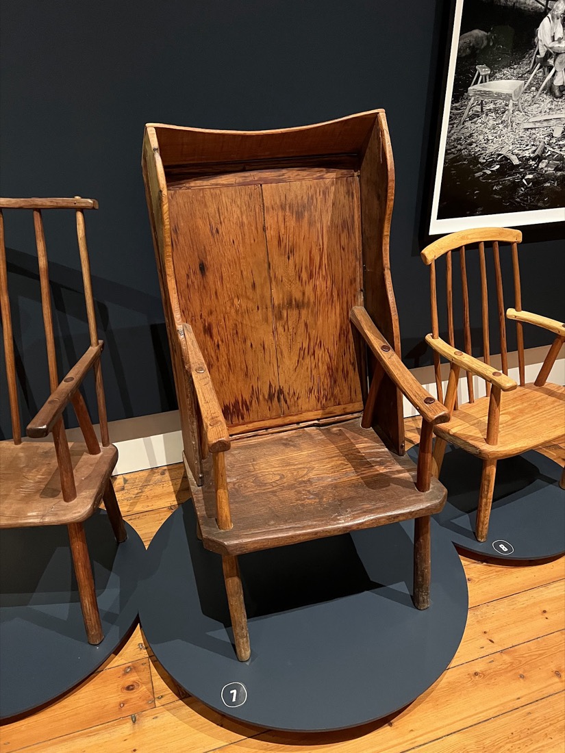A Jimmy Possum chair in richly figured timber.