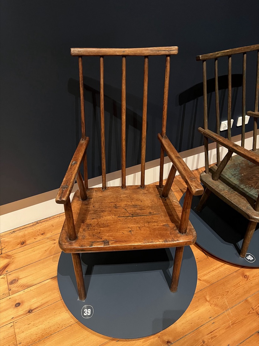 A green-painted Jimmy Possum armchair.