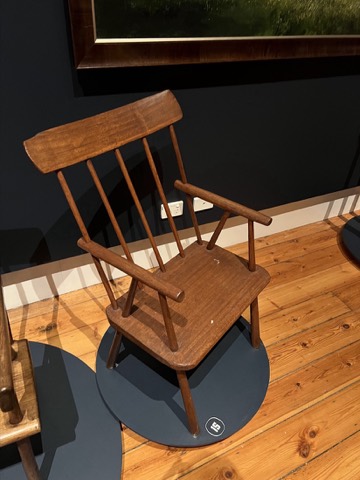 A wide-seated armchair.